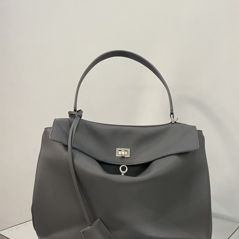 Ba*len*cia*ga top handle bags